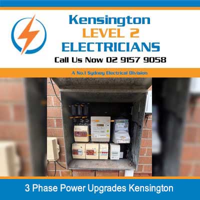 Electrical meter boxes and distribution boards installed on brick wall for 3 phase power upgrades in Kensington
