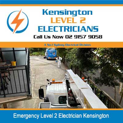 Emergency level 2 electrician utility truck with equipment ladder parked on residential street in Kensington