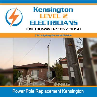 New power pole with overhead lines installed in front of residential home in Kensington